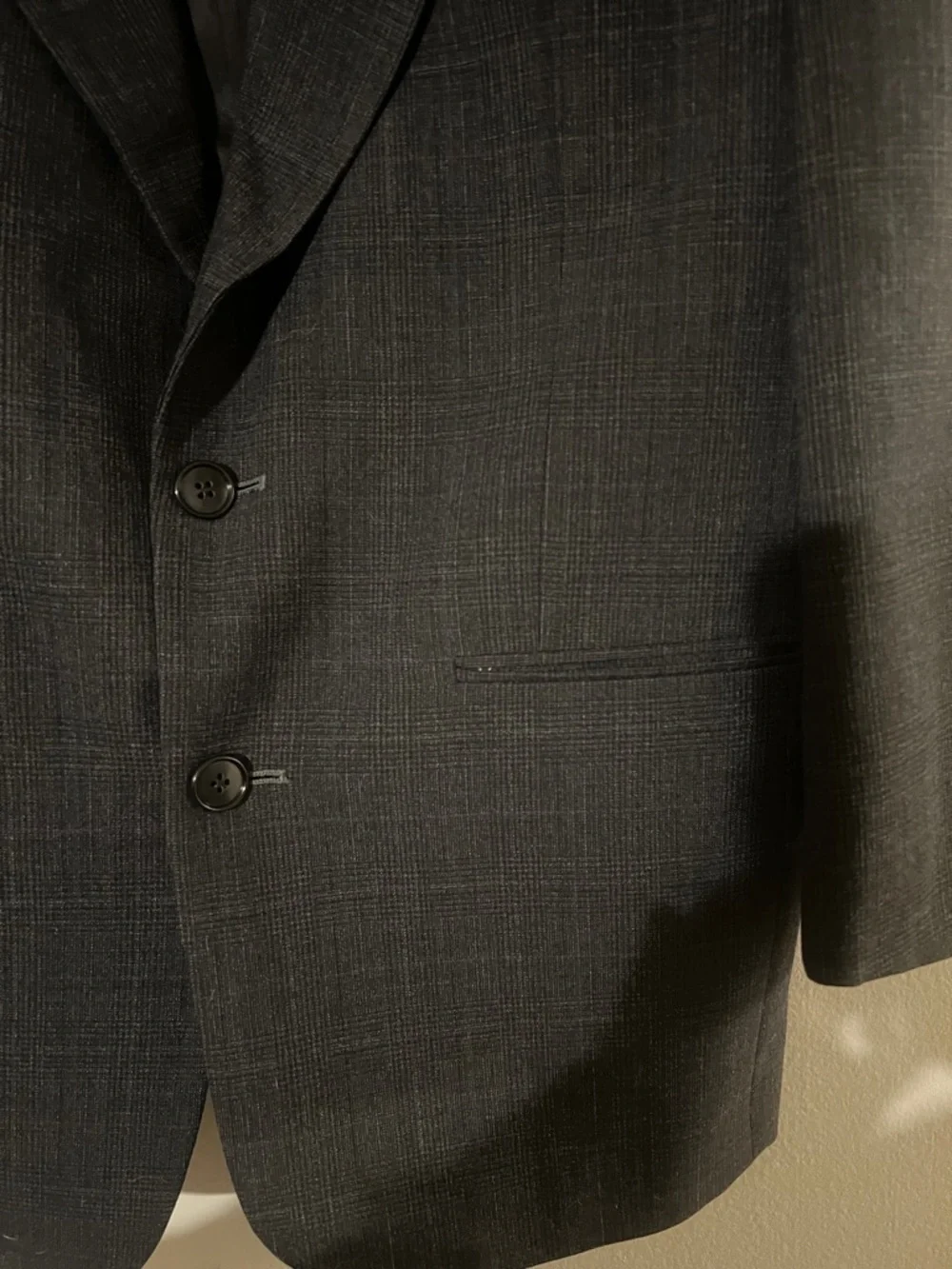 Jones New York dark gray single breasted suit. 100% wool gabardine.